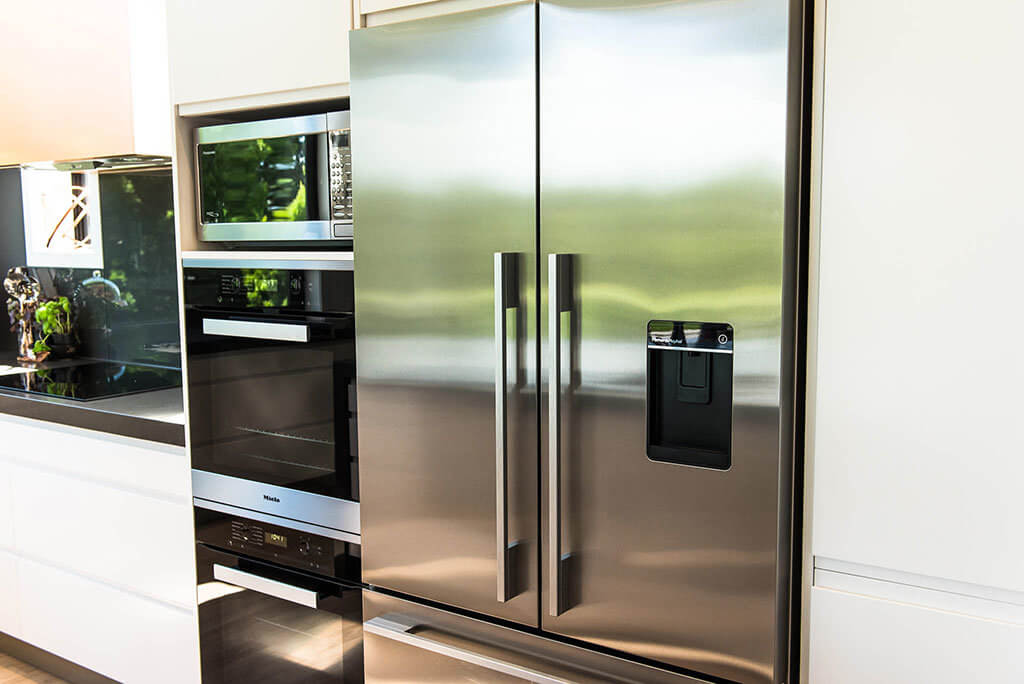 Fisher & Paykel fridge freezer with matching stainless trim kit