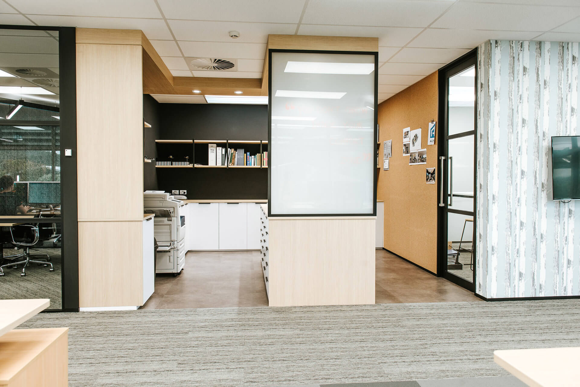 Stationary room in melamine with ceiling bulkhead.