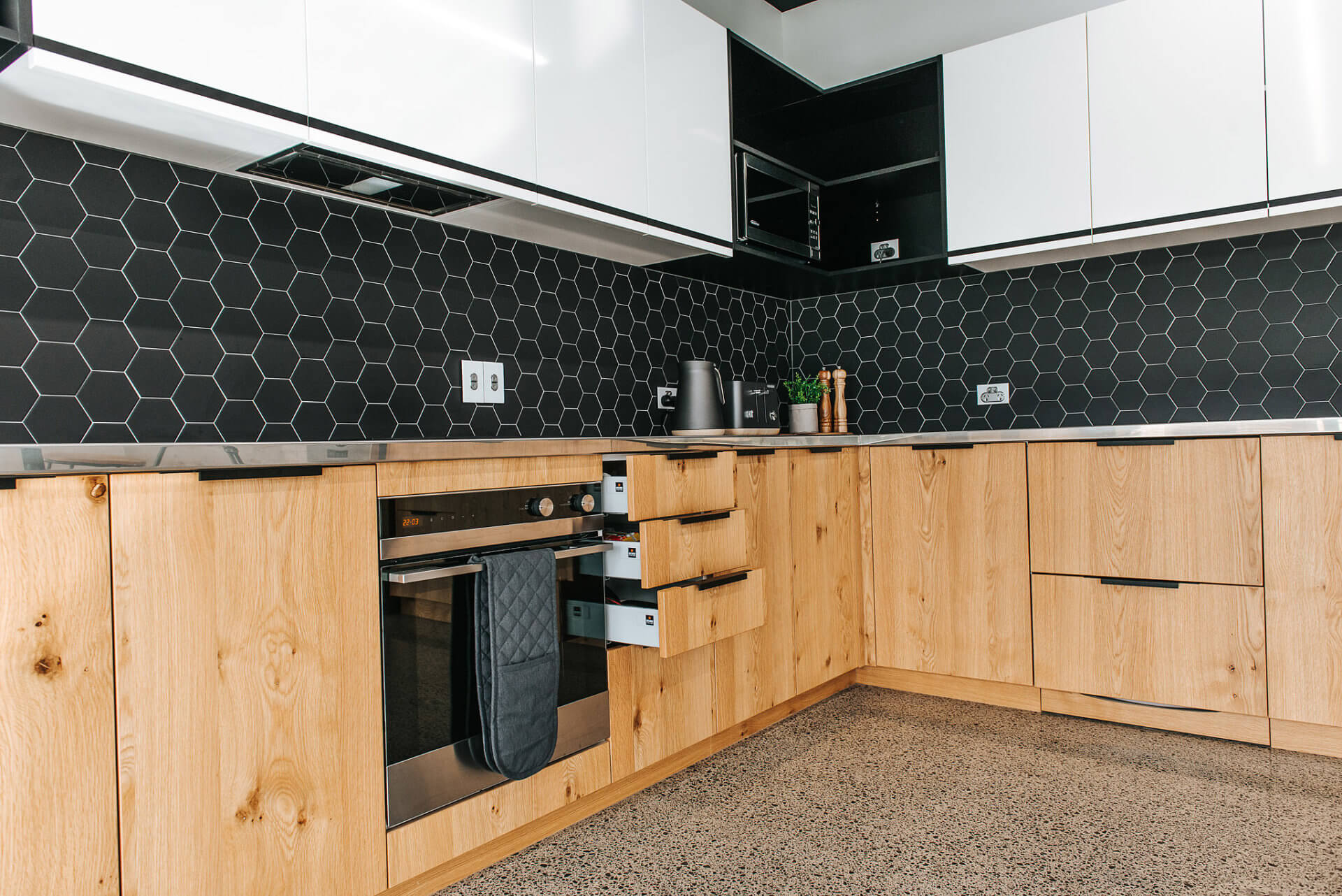 White gloss lacquer and natural Oak veneer doors.